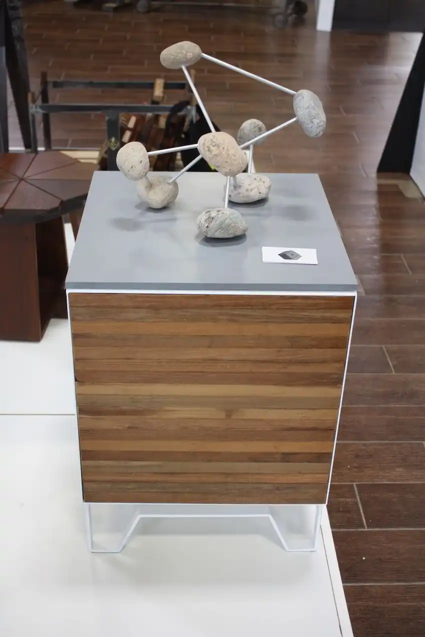While 2100Built specializes in fine finishing for homes and office spaces, it has launched a handmade custom furniture line that "at the intersection of craft and high-tech." This is a single cabinet that has a solid surface top. The unit can stand alone of be combined into larger pieces.