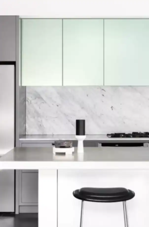 A Minimalist White, Green, and Gray Kitchen