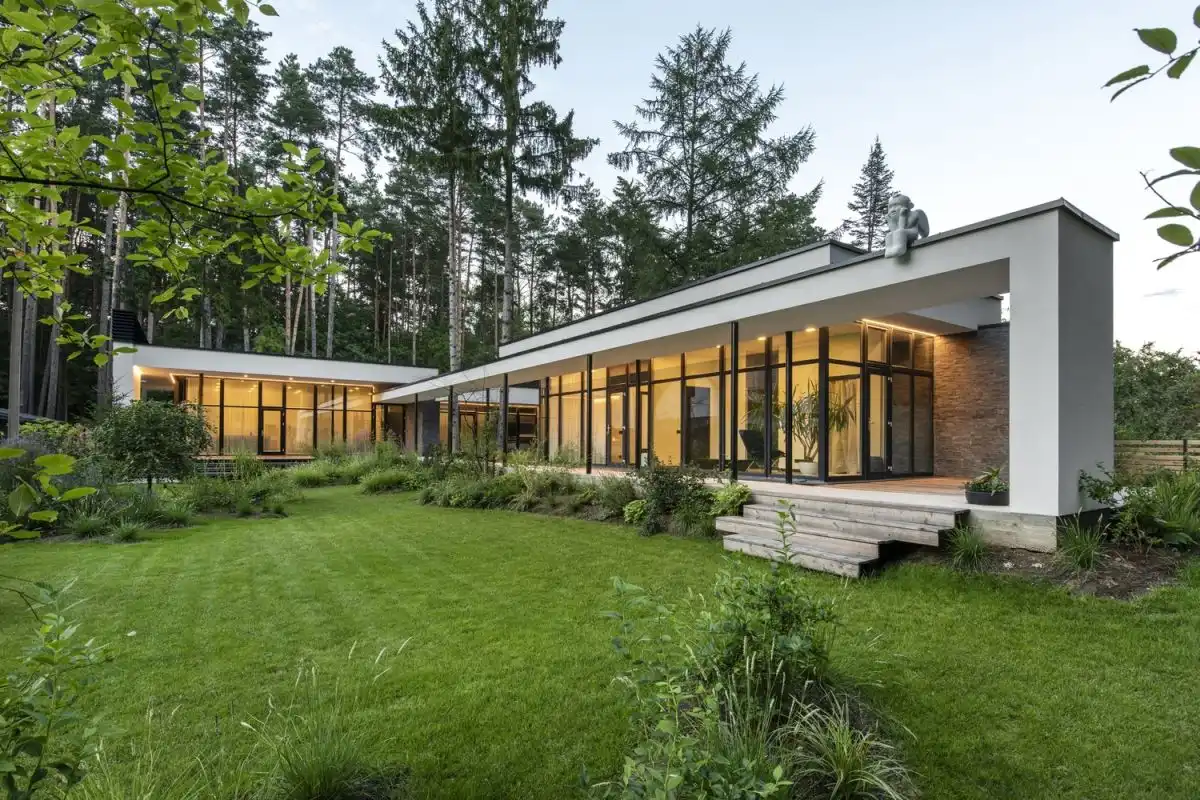 A modern house surrounded by trees in Vilnius