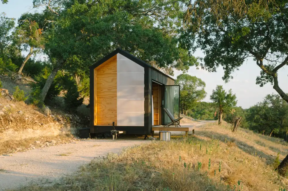A compact retreat with a folding glass wall