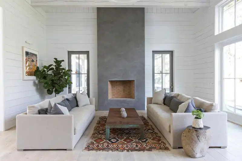 Add symmetry to living room with sofas