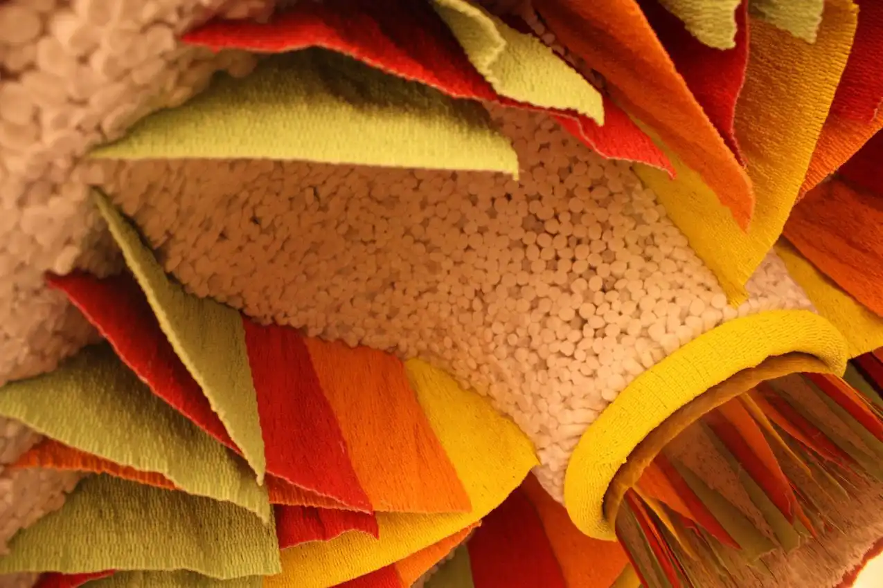 Colorful mushroom "gills" agains a spongy textured background are straight out of a childhood dream.