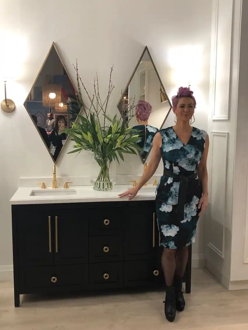 Diamond mirrors add flair to the sophisticated vanity.