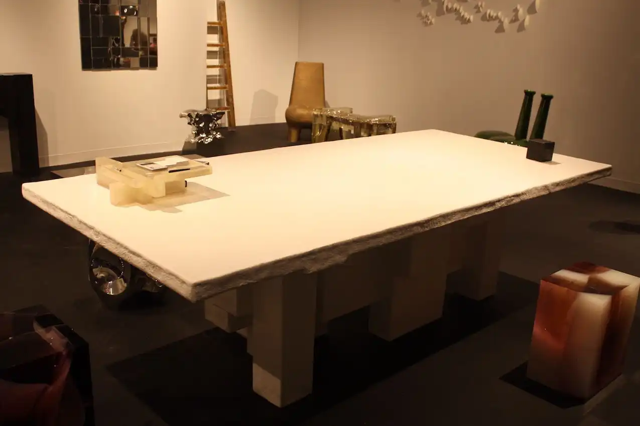 What may look like a typical table, this piece is actually a honeycomb structure made of corrugated cardboard that is covered with fiberglass and polyester resin.