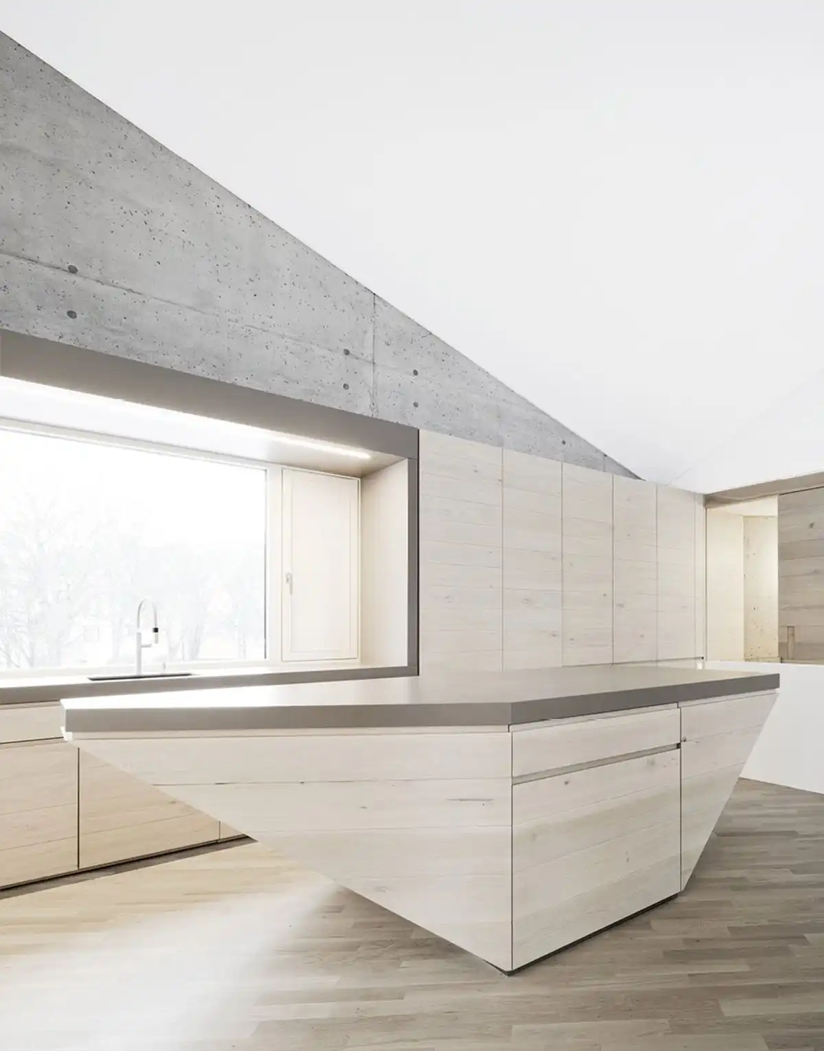 Angular concrete house design Kitchen island