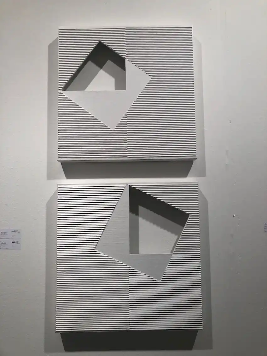 Playing up negative space adds dimension to a wall.