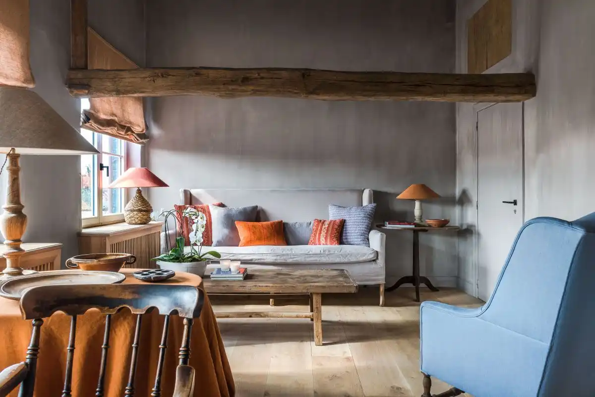 Antwerp-based Natalie Haegeman Interiors living room with wood beams
