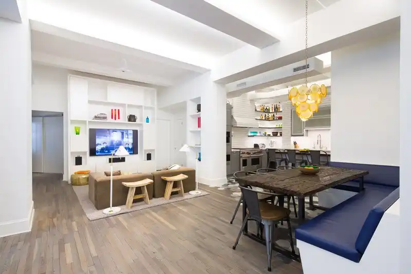 Apartment open space living room with large blue bench