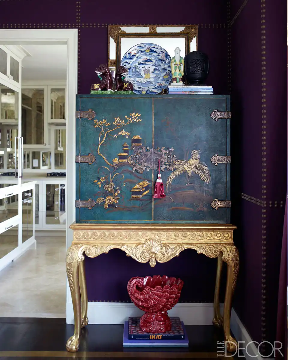 Asian cabinet with gilt base the dining room