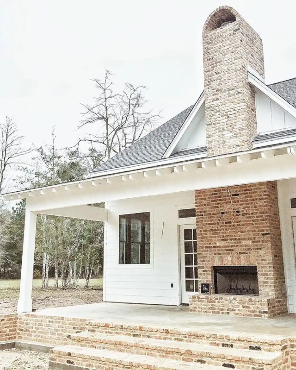 Back porch brick fireplace