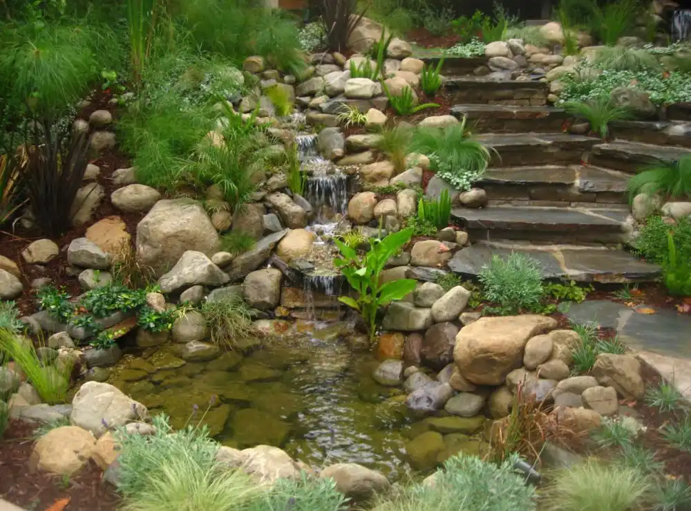 Backyard water fountain and stone steps