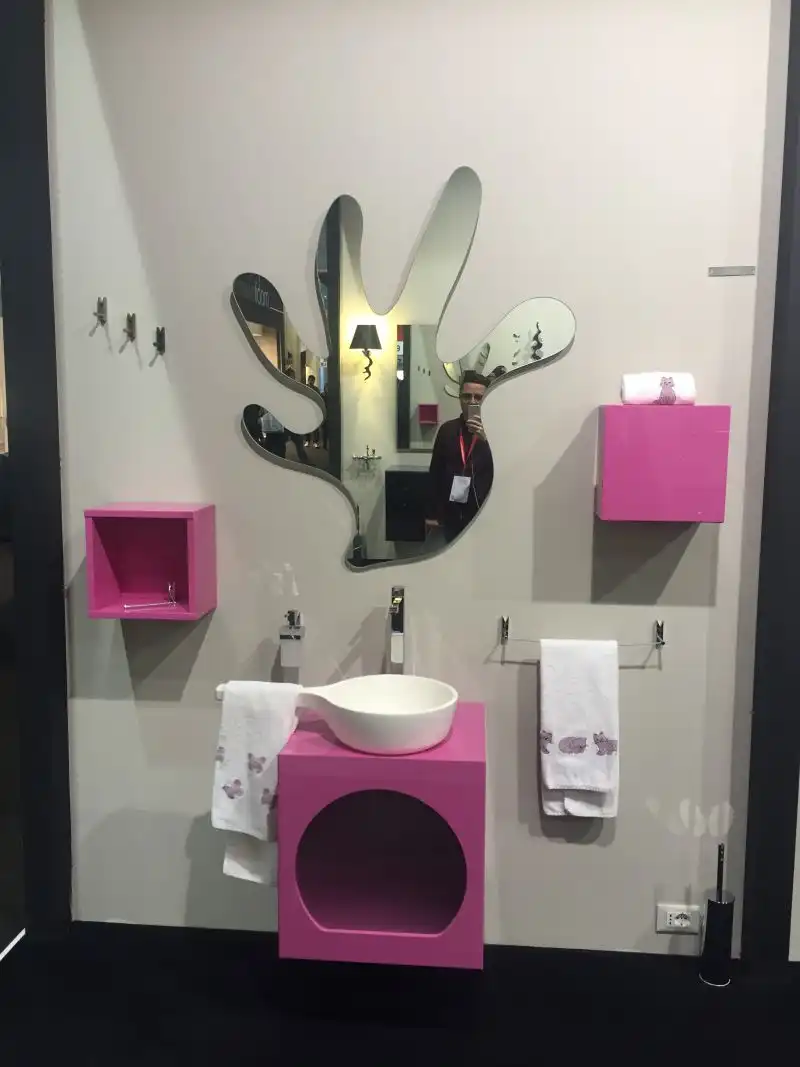 Bathroom designed for kids with pink accents