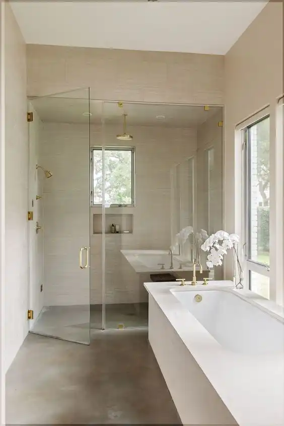Bathroom with a polished concrete floor including for shower