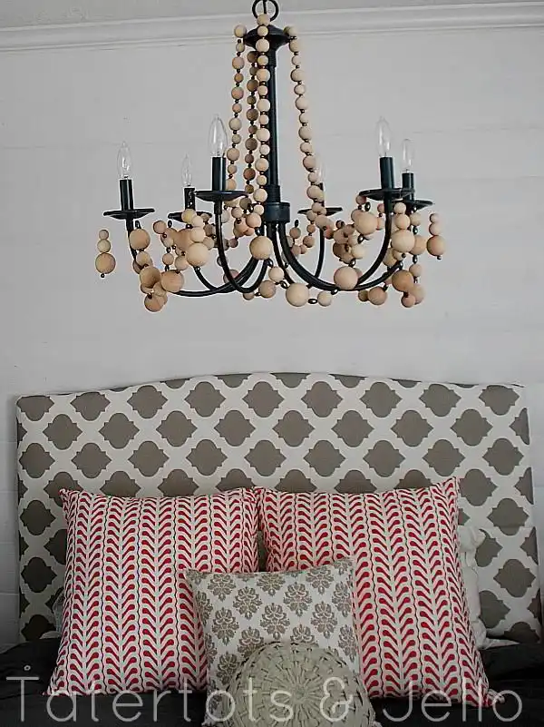 Beaded chandelier above the bed