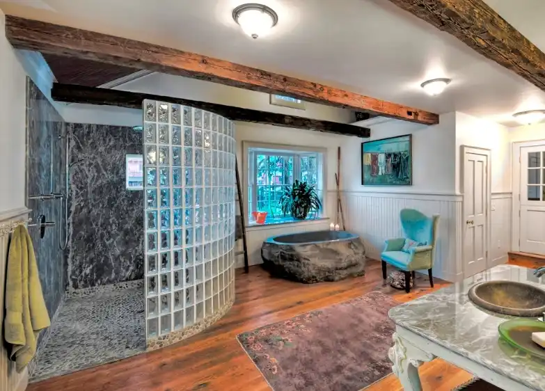 Add a Curved Glass Block Shower to a Rustic Bathroom