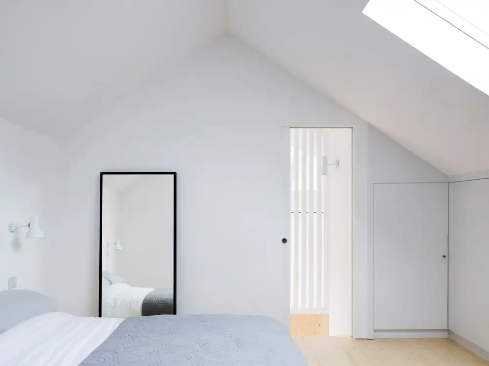 Bedroom Former warehouse into home by Paper House Project