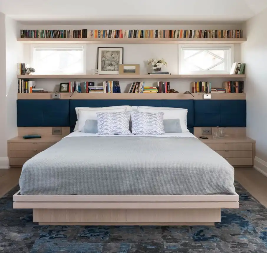 A bookcakse headboard is super functional.