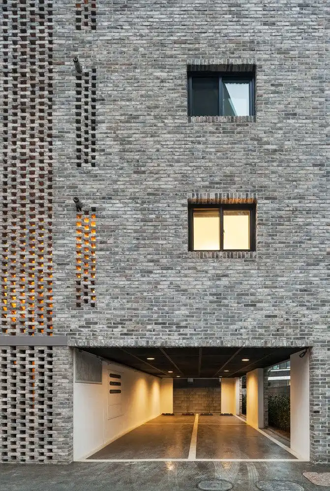 Beyond the Screen brick facade - OBBA - exterior