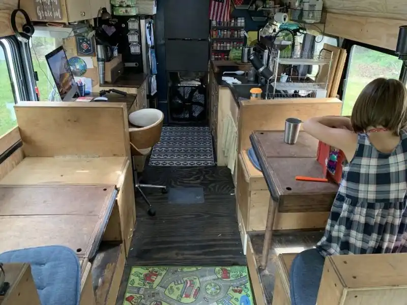 Big Family Living And Traveling in a School Bus Conversion dining room