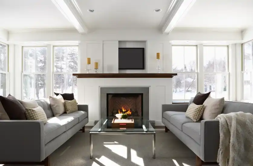 Big windows and a cozy fireplace
