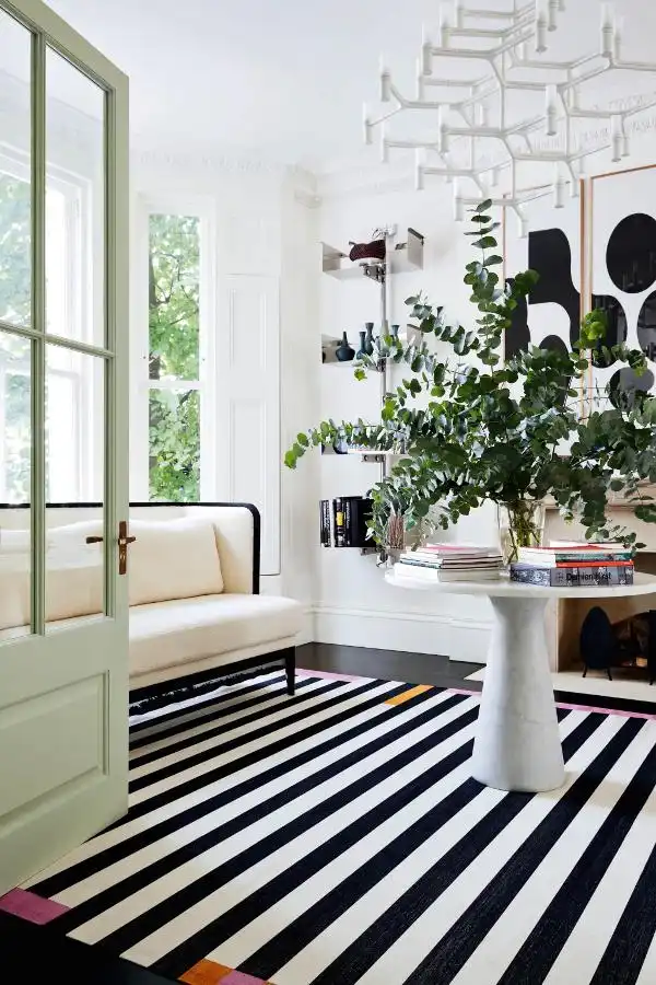 Feature, Notting Hill town house, contemporary, modern, graphic, geometric patterns, family home, bright, interior, sitting area, monochrome floor, rug, marble table, plant