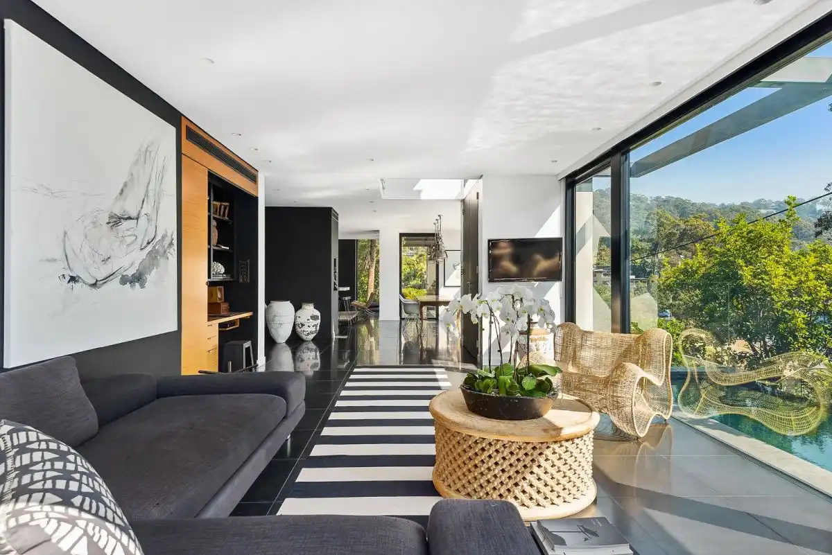 Black and white living room with beautiful view