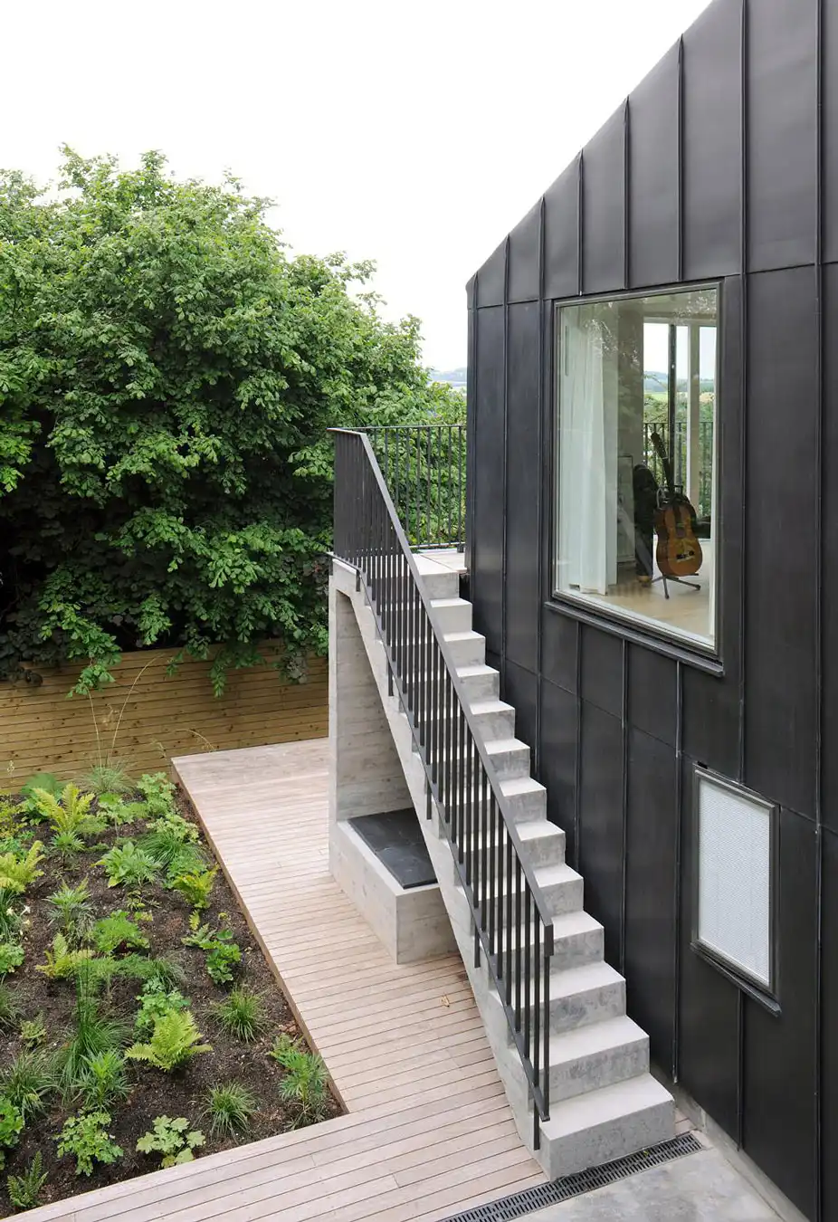 Black metallic stair railing for outdoor