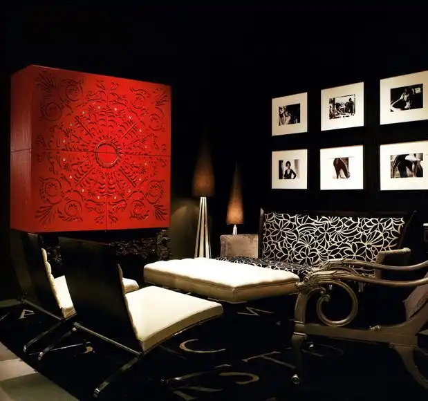 Black neutral room with bold red