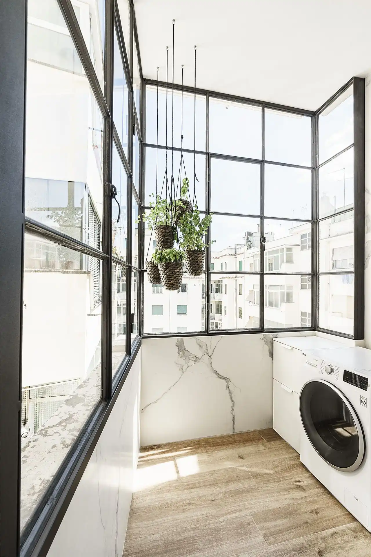 This lovely laundry room makes the task a delight.