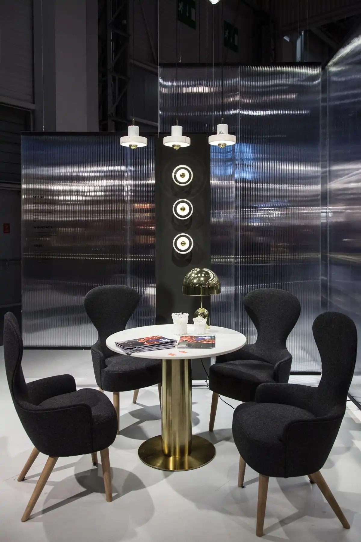 Black wingback Tomdixon chairs