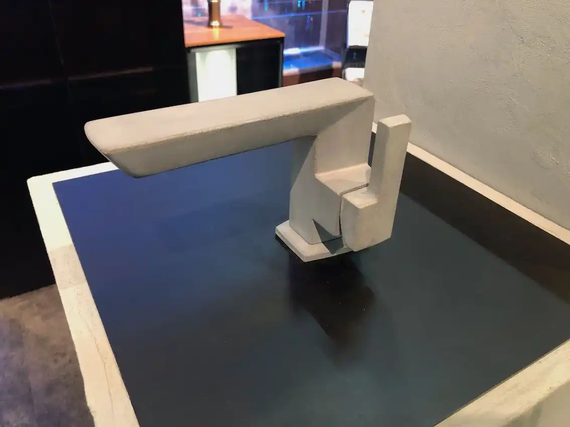 Concrete is a very unusual finish for a faucet.