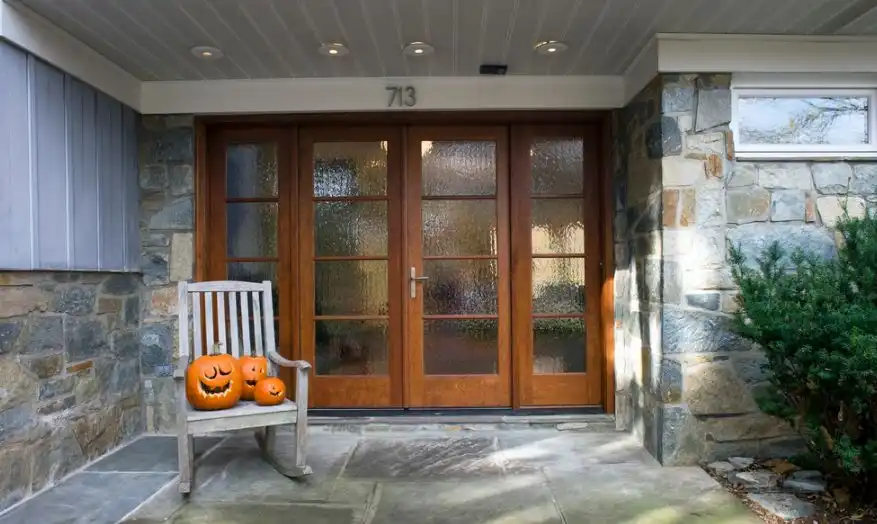 Brown front doors with rain glass