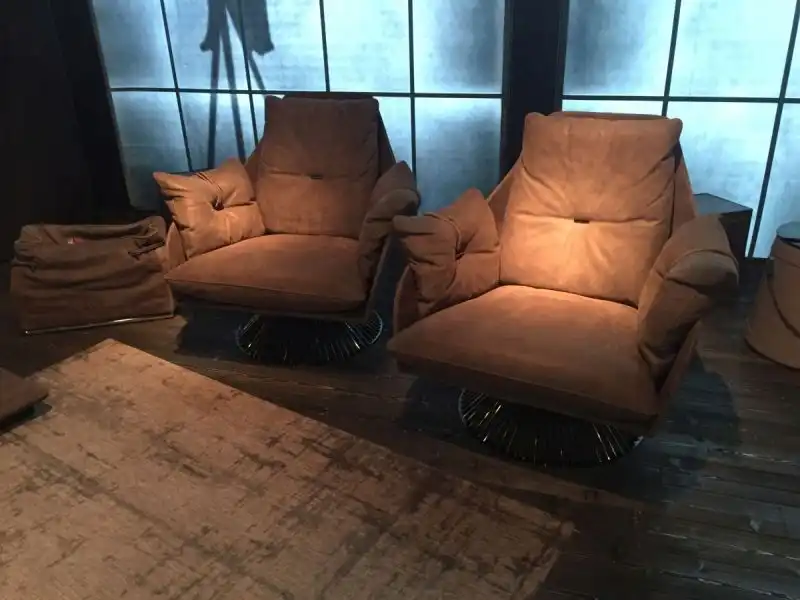 Brown leather armchairs for living room with a steel base