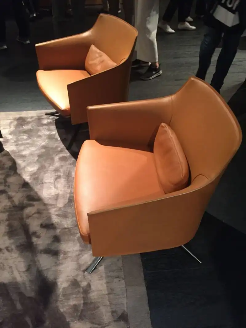 Brown leather armchairs