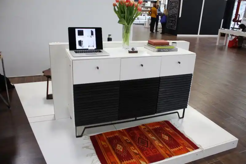 Here's an example of a larger piece 2100Build created from several of the smaller cabinet modules. The addition of drawer units makes it a taller piece as well. The ridged dark wood doors are flame-blackened for a deep, stunning finish.
