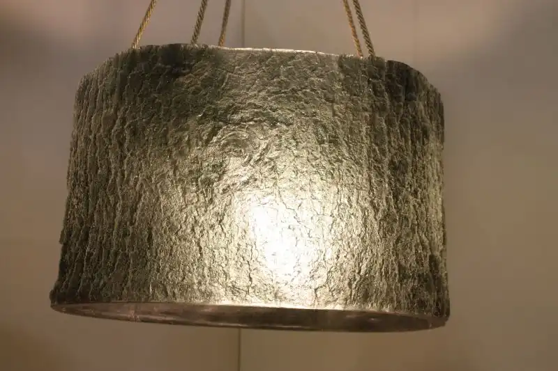 This gorgeously luminous light fixture is by Leonard Ursachi, Romanian-born sculptor and designer who is the creative force behind Calator Designs. The word calator means wanderer or traveler in Romania. Ursachi's Arbore, is his inaugural lighting collection. Each piece is hand cast in translucent, tinted resin in molds he has made from trees in Brooklyn.