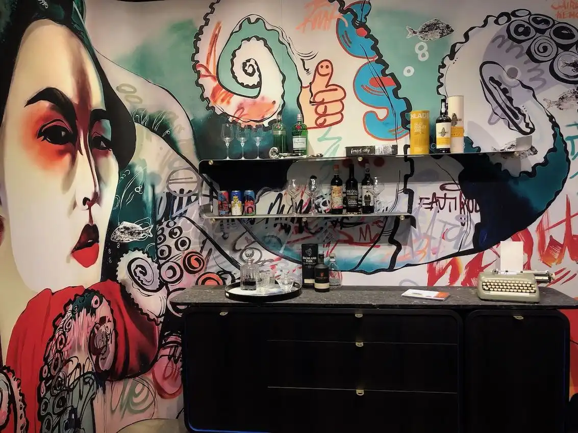 A retro cabinet works perfectly with the bold mural.