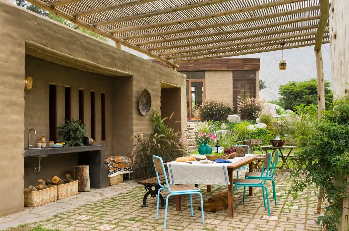 Casa Chontay by Marina Vella Arquitectos Turqouise chairs