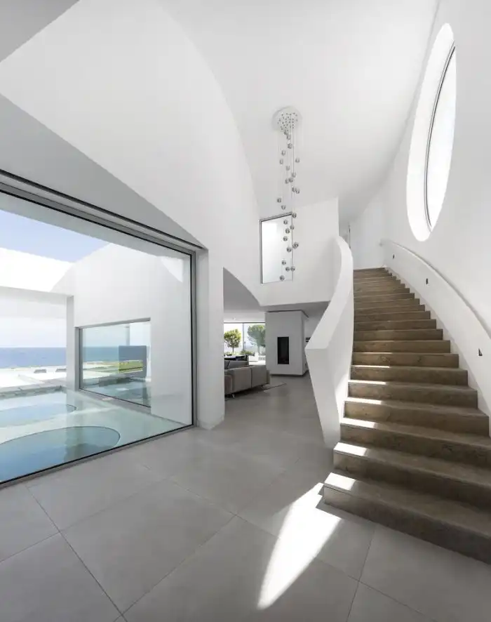 Casa Eliptica by Mario Martins Atelier staircase