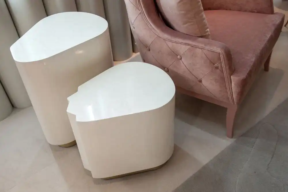 Cerne white side table with a small gold base