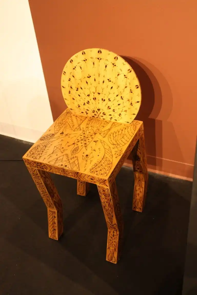 The chair is made from Cedar, who the design etched via pyrogravure.