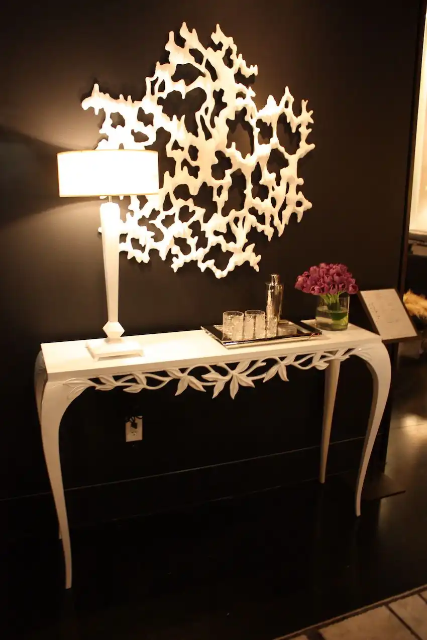 Artful consoles are ideal for an entryway.