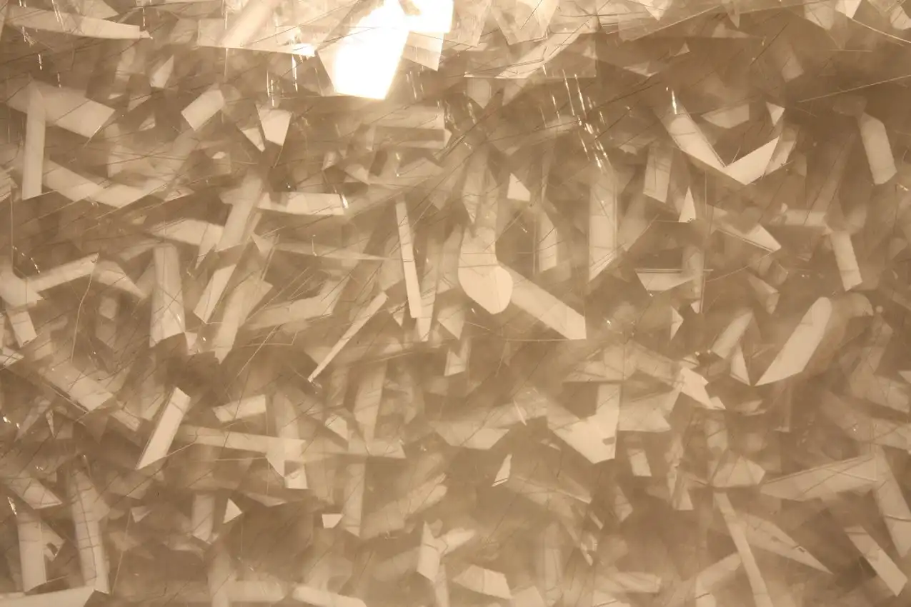 Closer inspection reveals the thin edges of countless glass pieces.