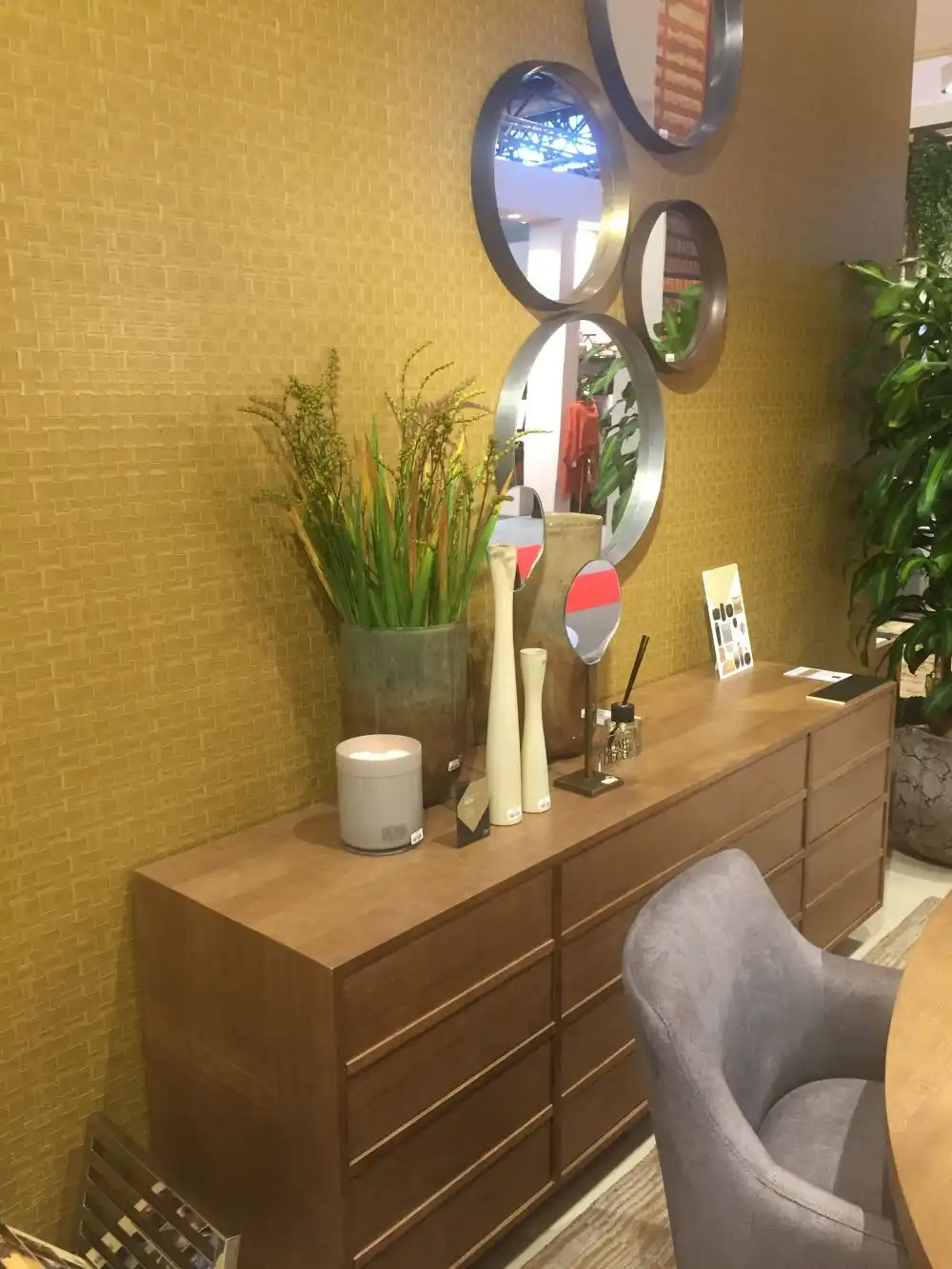 Collection of small round mirrors on the wall