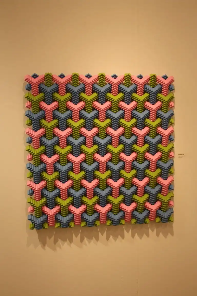Three dimensional angles are accented by the varying color pattern.