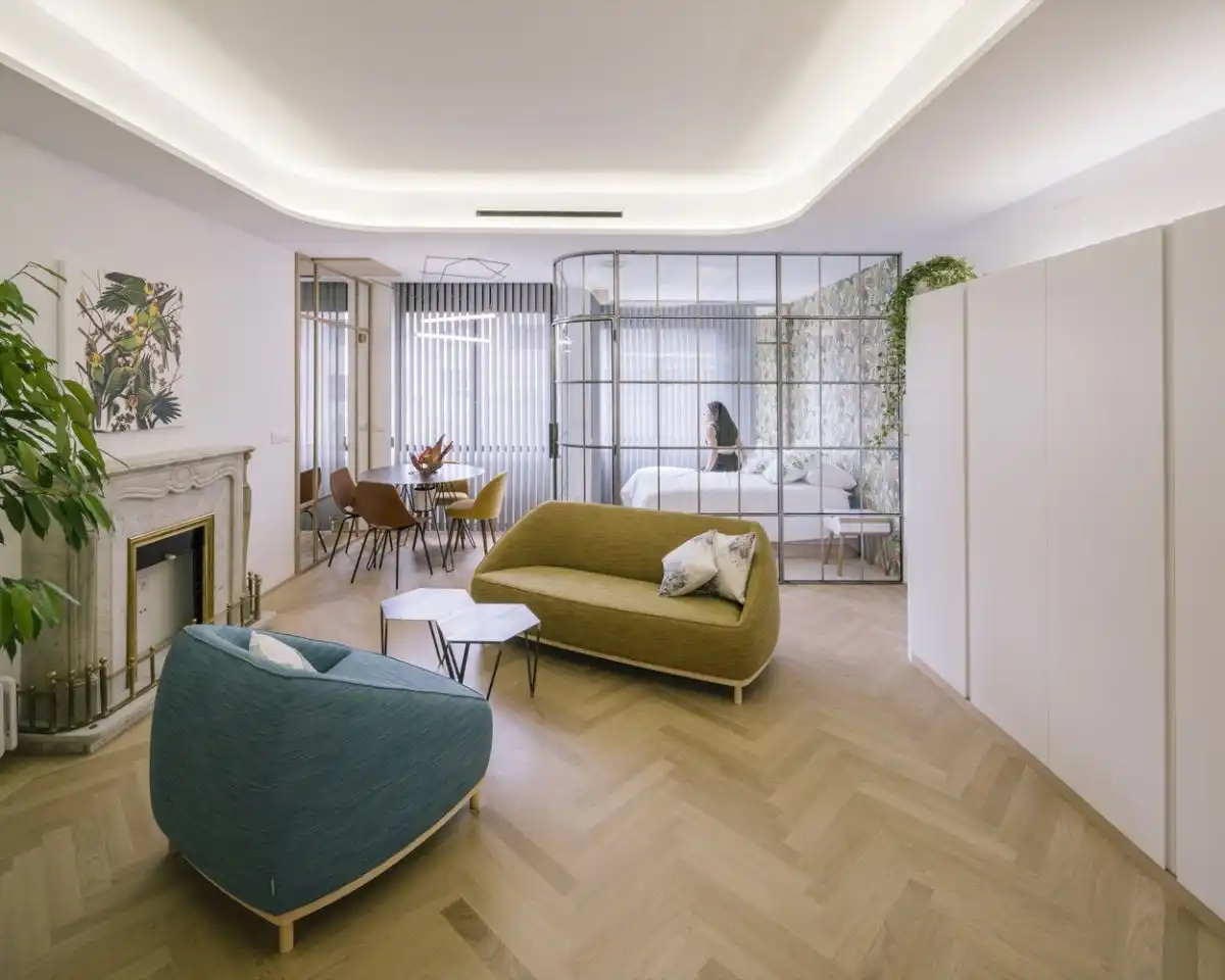 Comfortable and leggy furniture are perfect for this type of apartment