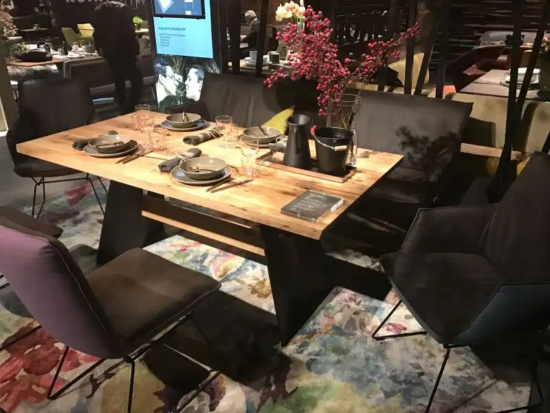 Contemporary dining room area with bench in black