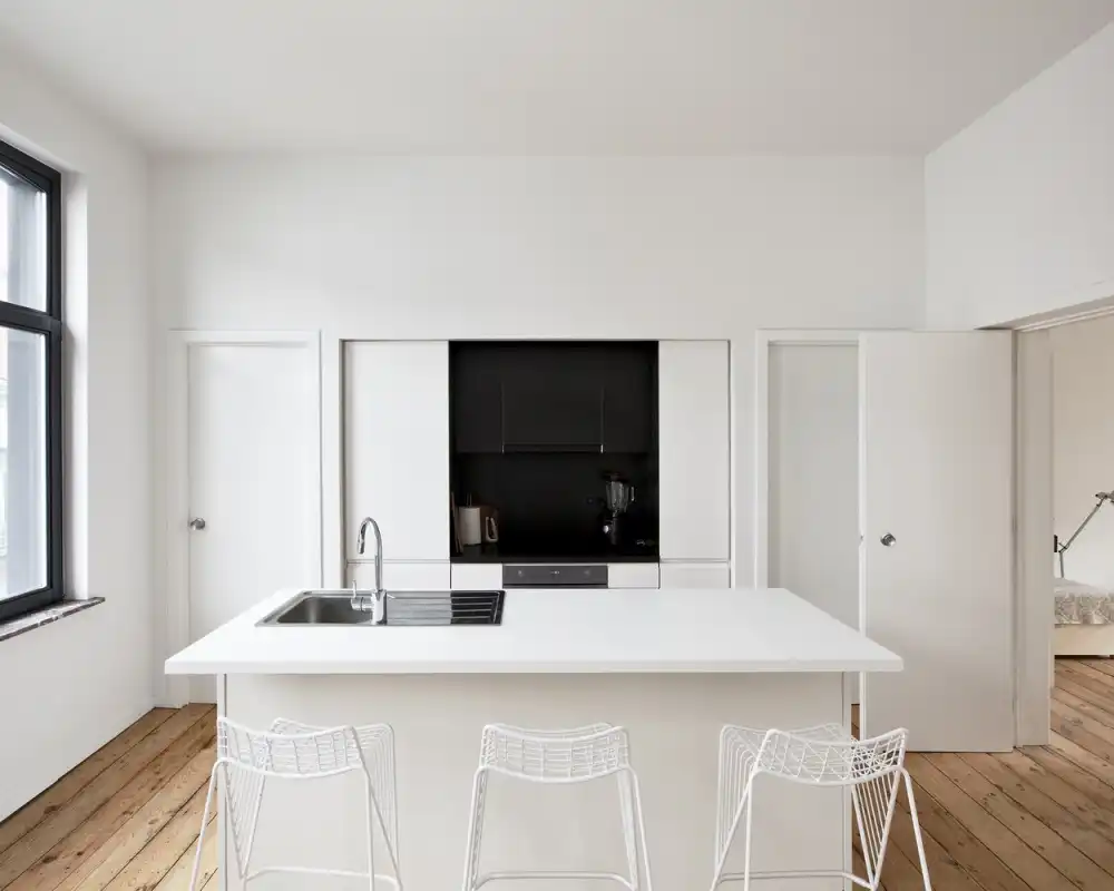 Conversion of a Townhouse in Brussels by Label architecture white kitchen