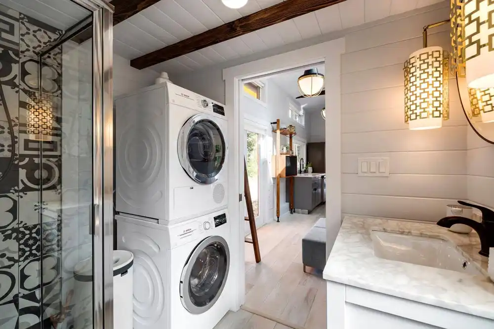 Cool tiny house on wheels with small bathroom