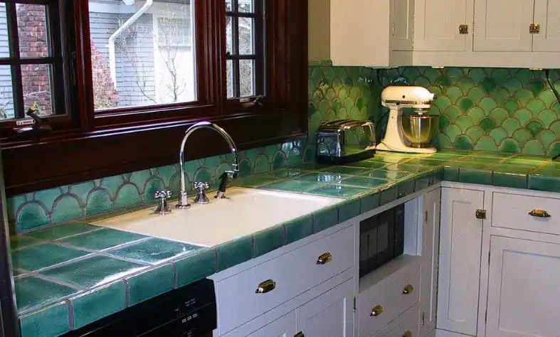 Countertop from porcelain tiles and backsplash in fish scale